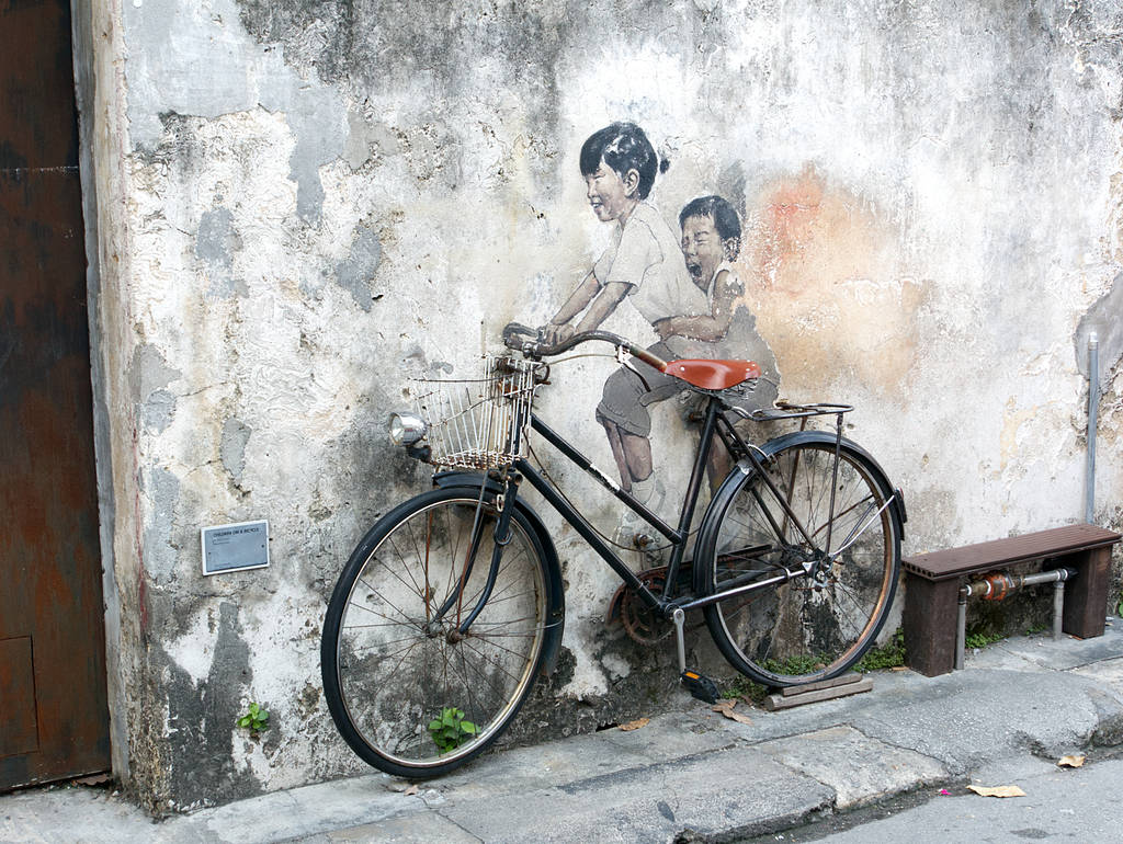 Street Art Kinder auf Fahrrad